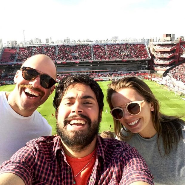 Selfie of 3 people at Independiente Club soccer game in Buenos Aires