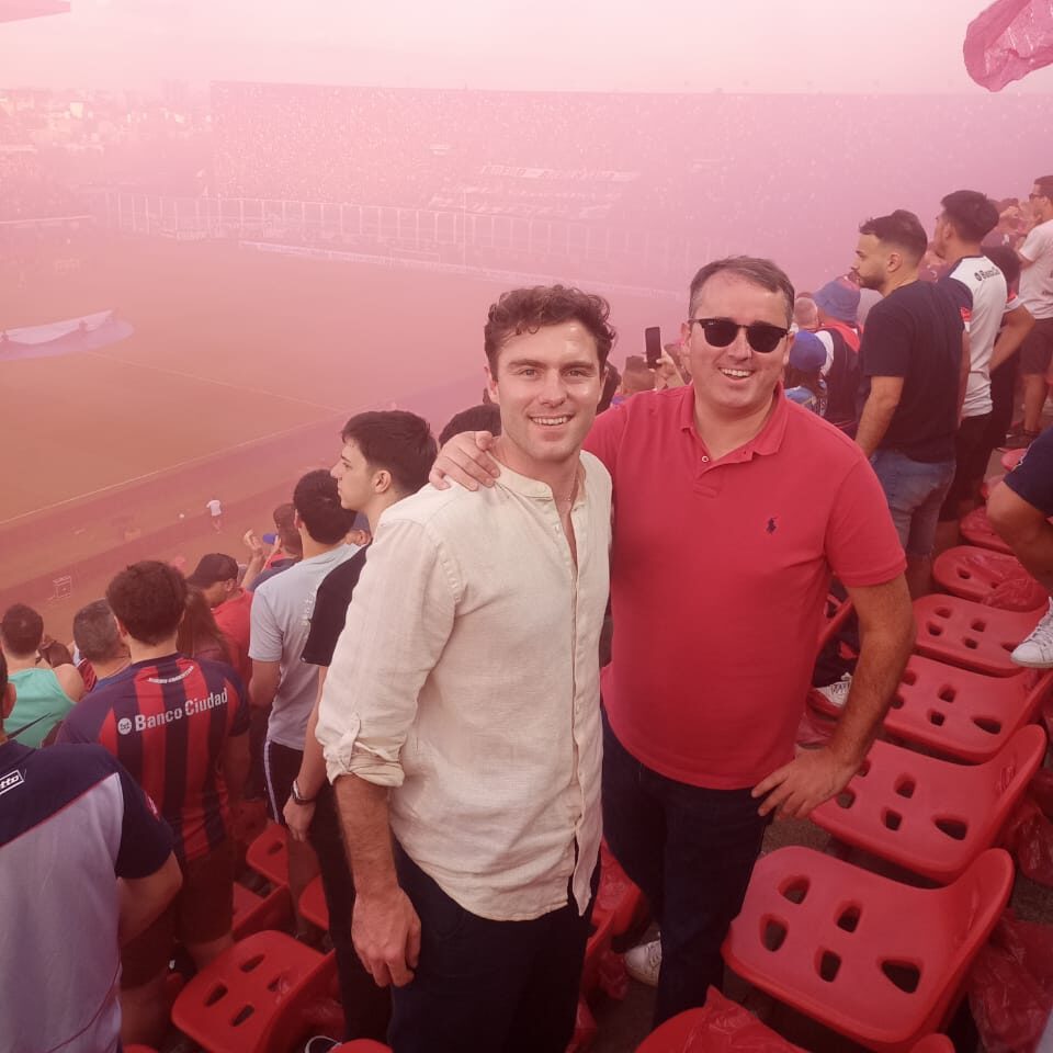 San Lorenzo pregame welcome with fans in red smoke